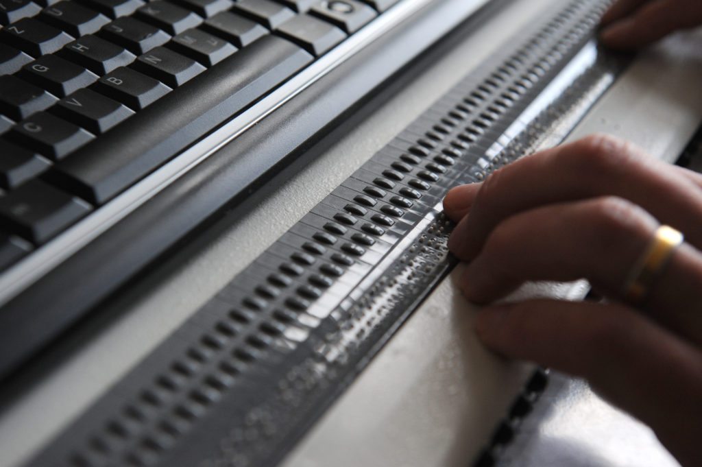 Braille Keyboard with hand typing